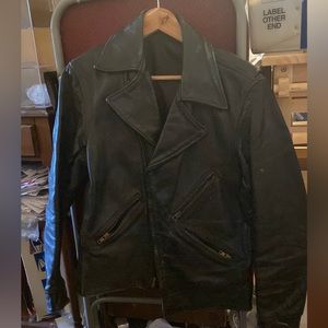 Vintage black leather jacket, men’s size small to medium